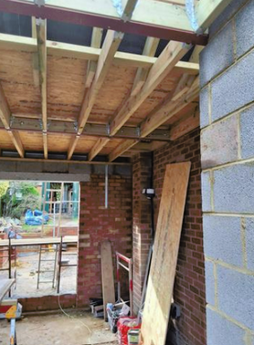 New garage into motorcycle workshop and front porch extension Project image