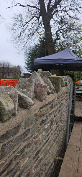 Church wall reconstruction after collapse Project image