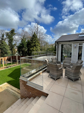 Single story hot tub extension, Porcelain patio & Landscaping Project image