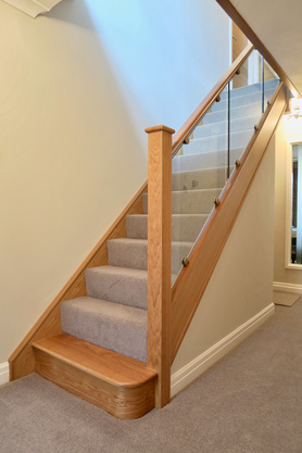 Oak and Glass Staircase  with Bullnose Feature Step Project image