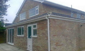 Ground and first floor extension with patio and bifold doors. Wetherby. Project image