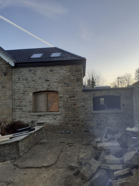 2 story stone extension Project image