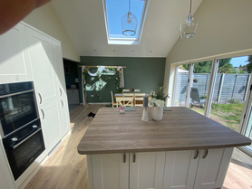 Single Storey Rear Kitchen Extension with dual pitched roof & vaulted ceiling alongside partial garage conversion Project image