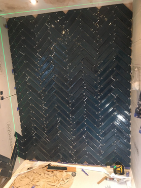 New bathroom with herringbone tiling Project image