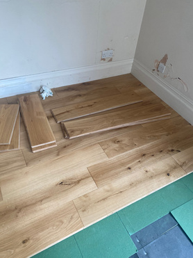 New oak flooring and oak bar in stud farm Manor House   Project image