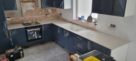 compact kitchen worktops and flooring Project image