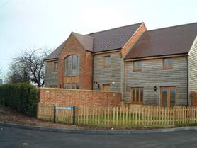 new development of barn style homes Project image