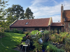 attached bricks and flint annexe  Project image