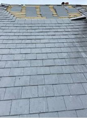 Stripping of existing roof and re-tile, lead work and chimney work Project image