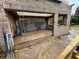 Demolition of an old conservatory and build a new larger extension.  Project image