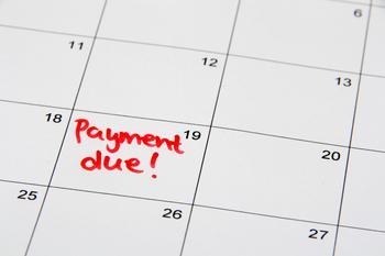 Image of a calendar with late payments