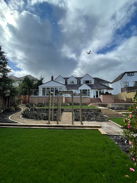 Single story hot tub extension, Porcelain patio & Landscaping Project image