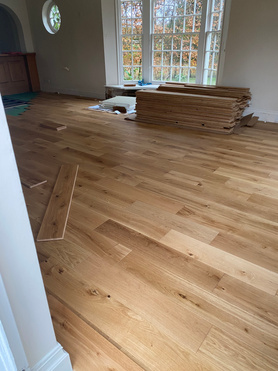 New oak flooring and oak bar in stud farm Manor House   Project image