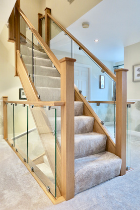 Oak and Glass Staircase Renovation in Altrincham Project image