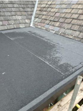 Flat roof. and re-roofing of a pitched roof Project image