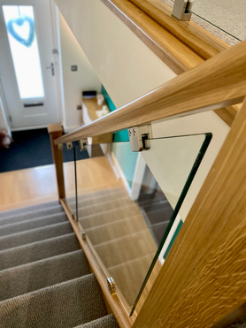 Oak and Glass Staircase Renovation with a Solid Oak Bullnose Step Project image