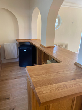 New oak flooring and oak bar in stud farm Manor House   Project image