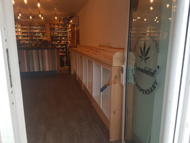 vape shop stand and cupboard with fancy chulk board  Project image