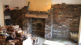 Before and After Traditional Feature Fireplace Wall with a Modern Twist Project image