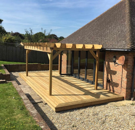 New bi-fold doors and decking area Project image