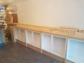 vape shop stand and cupboard with fancy chulk board  Project image