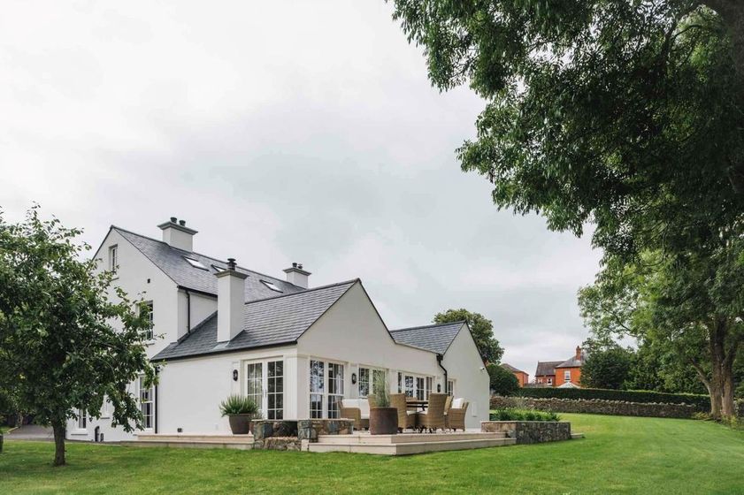 Large rear house extension blends with the original architecture