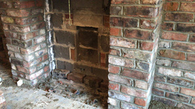 Before and After Traditional Feature Fireplace Wall with a Modern Twist Project image